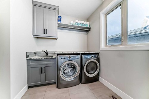 64 Walcrest View Se, Calgary, AB - Indoor Photo Showing Laundry Room