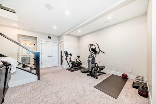 64 Walcrest View Se, Calgary, AB - Indoor Photo Showing Gym Room