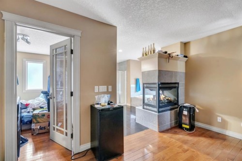 35 Cranleigh Drive Se, Calgary, AB - Indoor With Fireplace