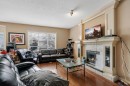 35 Cranleigh Drive Se, Calgary, AB  - Indoor Photo Showing Living Room With Fireplace 