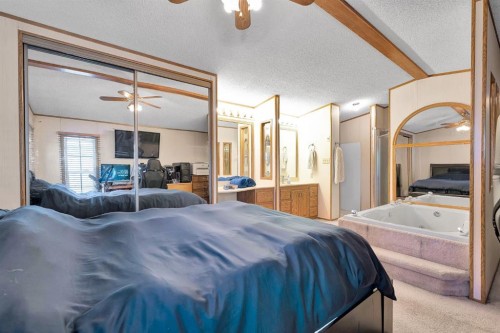 254 Erin Woods Circle Se, Calgary, AB - Indoor Photo Showing Bedroom