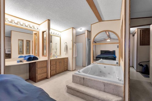 254 Erin Woods Circle Se, Calgary, AB - Indoor Photo Showing Bedroom