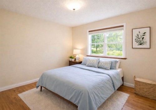 254 Erin Woods Circle Se, Calgary, AB - Indoor Photo Showing Bedroom