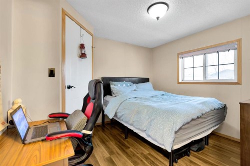 254 Erin Woods Circle Se, Calgary, AB - Indoor Photo Showing Bedroom