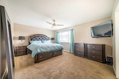 322 Windridge View Sw, Airdrie, AB - Indoor Photo Showing Bedroom