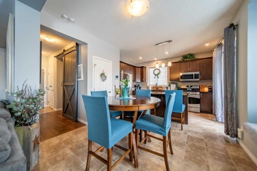 322 Windridge View Sw, Airdrie, AB - Indoor Photo Showing Dining Room