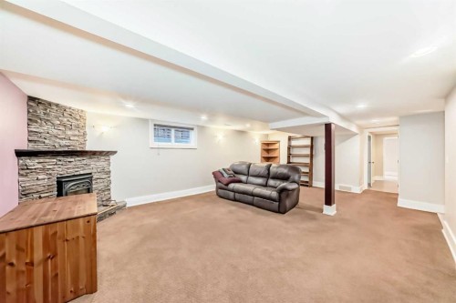 452 13 Street Nw, Calgary, AB - Indoor With Fireplace