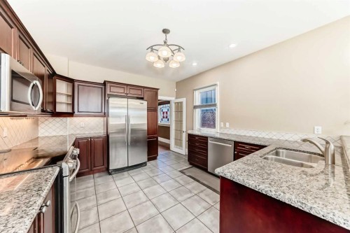 452 13 Street Nw, Calgary, AB - Indoor Photo Showing Kitchen With Double Sink