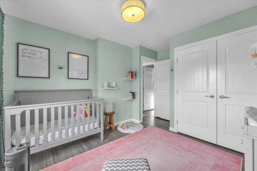 301 Mcleod Crescent, Diamond Valley, AB - Indoor Photo Showing Bedroom