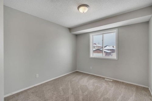 41 Saddlefield Drive Ne, Calgary, AB - Indoor Photo Showing Other Room