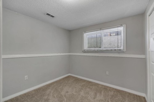 41 Saddlefield Drive Ne, Calgary, AB - Indoor Photo Showing Other Room