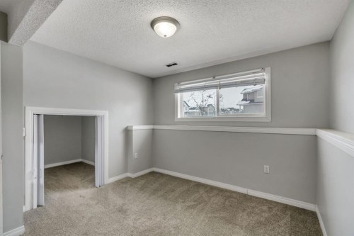 41 Saddlefield Drive Ne, Calgary, AB - Indoor Photo Showing Other Room