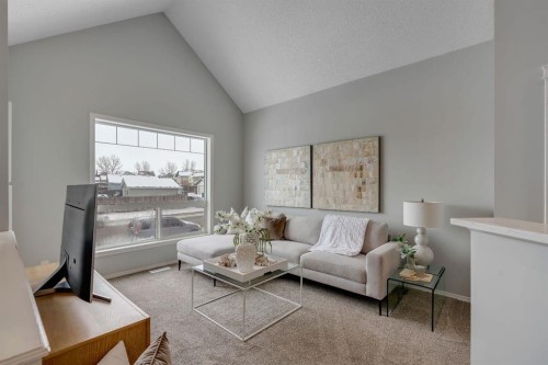 41 Saddlefield Drive Ne, Calgary, AB - Indoor Photo Showing Living Room