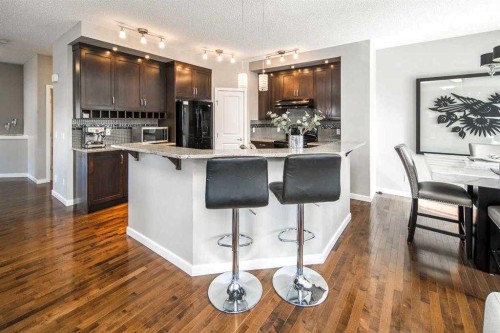 5 Panatella Square Nw, Calgary, AB - Indoor Photo Showing Kitchen With Upgraded Kitchen