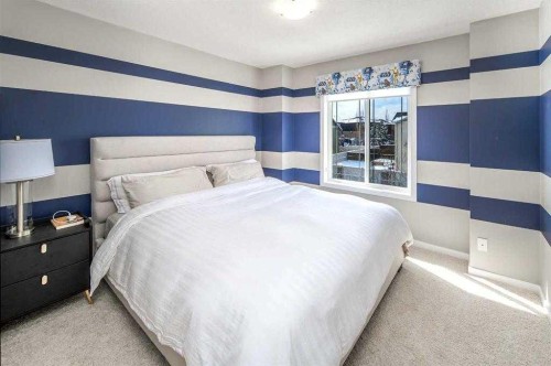 5 Panatella Square Nw, Calgary, AB - Indoor Photo Showing Bedroom