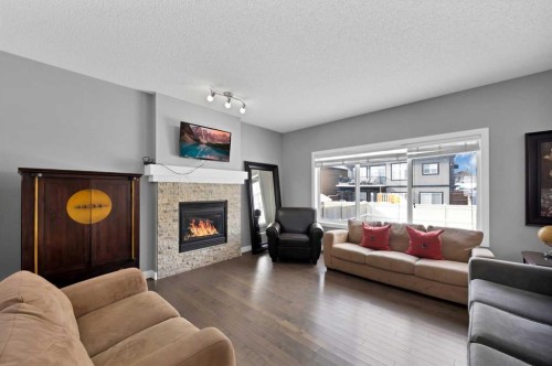 629 Marina Drive, Chestermere, AB - Indoor Photo Showing Living Room With Fireplace