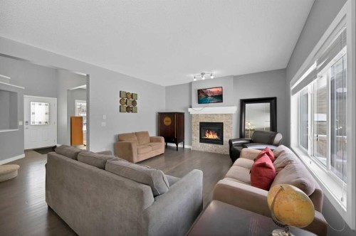 629 Marina Drive, Chestermere, AB - Indoor Photo Showing Living Room With Fireplace