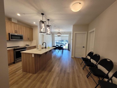 3110-200 Seton Circle Se, Calgary, AB - Indoor Photo Showing Kitchen