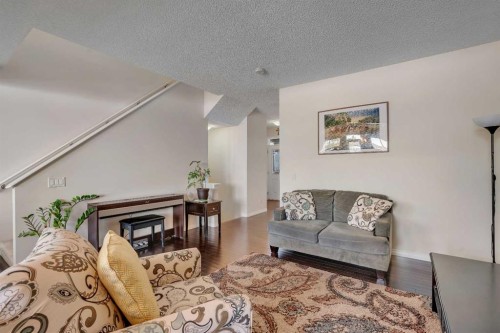 245 Auburn Crest Way Se, Calgary, AB - Indoor Photo Showing Living Room With Fireplace