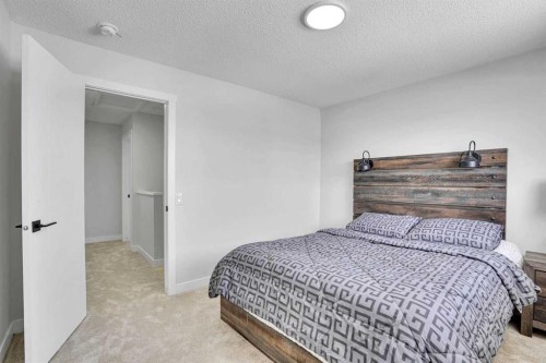 7842 21A Street Se, Calgary, AB - Indoor Photo Showing Bedroom