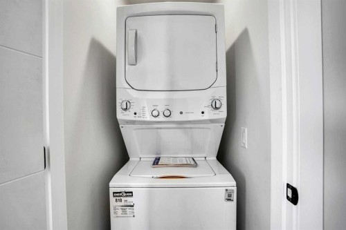 7842 21A Street Se, Calgary, AB - Indoor Photo Showing Laundry Room