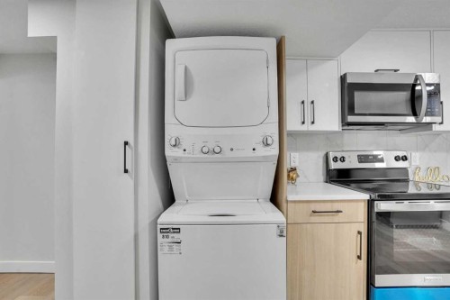 7842 21A Street Se, Calgary, AB - Indoor Photo Showing Laundry Room