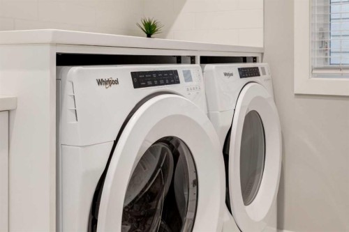 40 Timberline Way Sw, Calgary, AB - Indoor Photo Showing Laundry Room