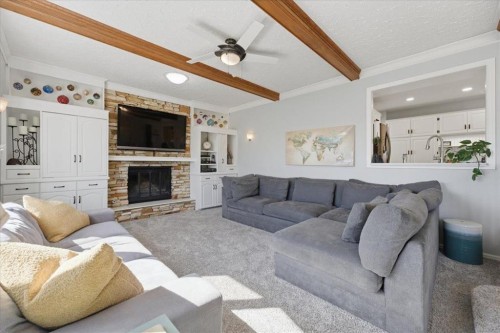 2804 49 Street Sw, Calgary, AB - Indoor Photo Showing Living Room With Fireplace