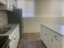 5805 56 Avenue, Red Deer, AB  - Indoor Photo Showing Kitchen With Double Sink 
