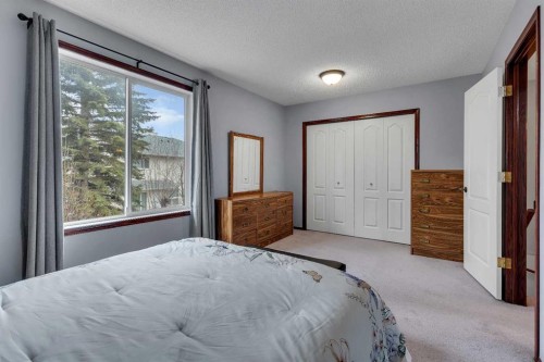 47 Carmel Close Ne, Calgary, AB - Indoor Photo Showing Bedroom