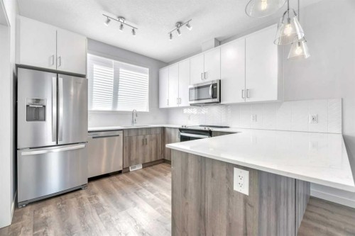337-301 Redstone Boulevard Ne, Calgary, AB - Indoor Photo Showing Kitchen With Stainless Steel Kitchen With Upgraded Kitchen