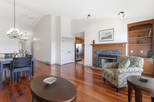 54 Edgeland Close Nw, Calgary, AB - Indoor Photo Showing Living Room With Fireplace