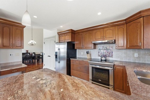 54 Edgeland Close Nw, Calgary, AB - Indoor Photo Showing Kitchen With Double Sink