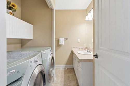 54 Edgeland Close Nw, Calgary, AB - Indoor Photo Showing Laundry Room