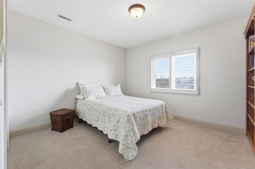 54 Edgeland Close Nw, Calgary, AB - Indoor Photo Showing Bedroom