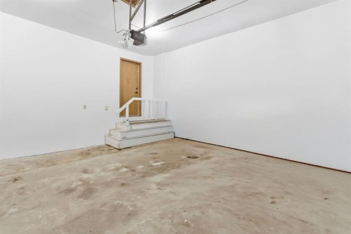 54 Edgeland Close Nw, Calgary, AB - Indoor Photo Showing Garage