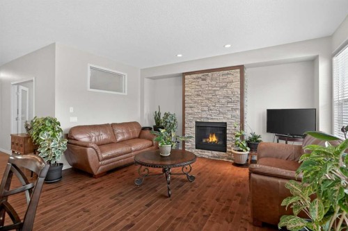 24 Legacy Landing, Calgary, AB - Indoor Photo Showing Living Room With Fireplace