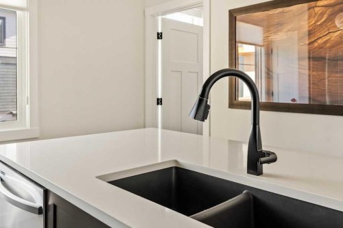  - Indoor Photo Showing Kitchen With Double Sink