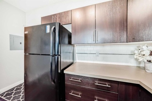 405-2300 Evanston Square, Calgary, AB - Indoor Photo Showing Kitchen
