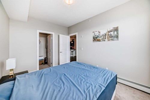 405-2300 Evanston Square, Calgary, AB - Indoor Photo Showing Bedroom