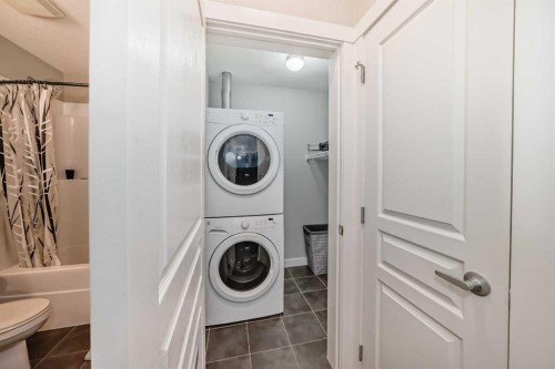 405-2300 Evanston Square, Calgary, AB - Indoor Photo Showing Laundry Room