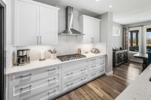 209 Sandpiper Crescent, Chestermere, AB - Indoor Photo Showing Kitchen With Upgraded Kitchen
