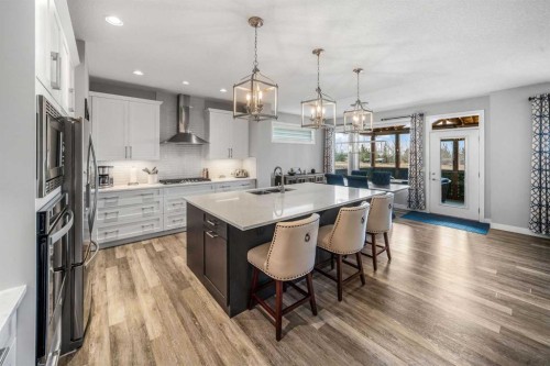 209 Sandpiper Crescent, Chestermere, AB - Indoor Photo Showing Kitchen With Upgraded Kitchen