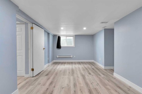 44 Strathclair Rise Sw, Calgary, AB - Indoor Photo Showing Other Room