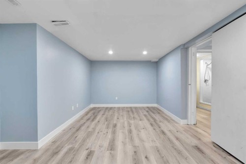 44 Strathclair Rise Sw, Calgary, AB - Indoor Photo Showing Other Room