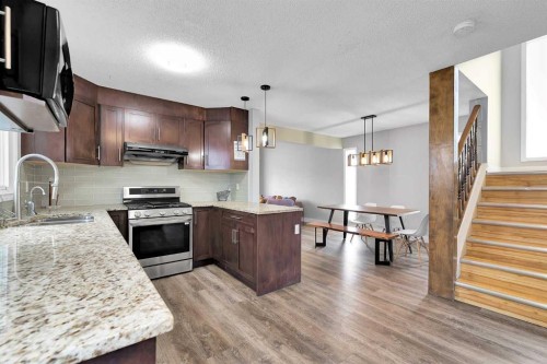 44 Strathclair Rise Sw, Calgary, AB - Indoor Photo Showing Kitchen With Double Sink