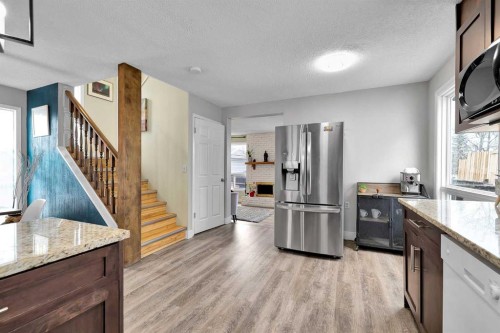 44 Strathclair Rise Sw, Calgary, AB - Indoor Photo Showing Kitchen With Upgraded Kitchen