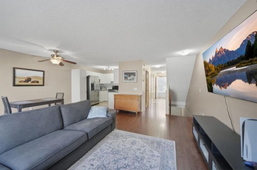94 Mt Aberdeen Manor Se, Calgary, AB - Indoor Photo Showing Living Room