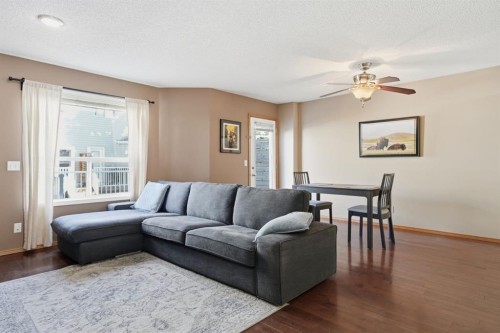 94 Mt Aberdeen Manor Se, Calgary, AB - Indoor Photo Showing Living Room