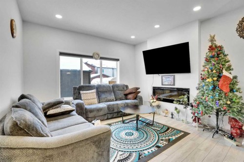 181 Walcrest Boulevard, Calgary, AB - Indoor Photo Showing Living Room With Fireplace
